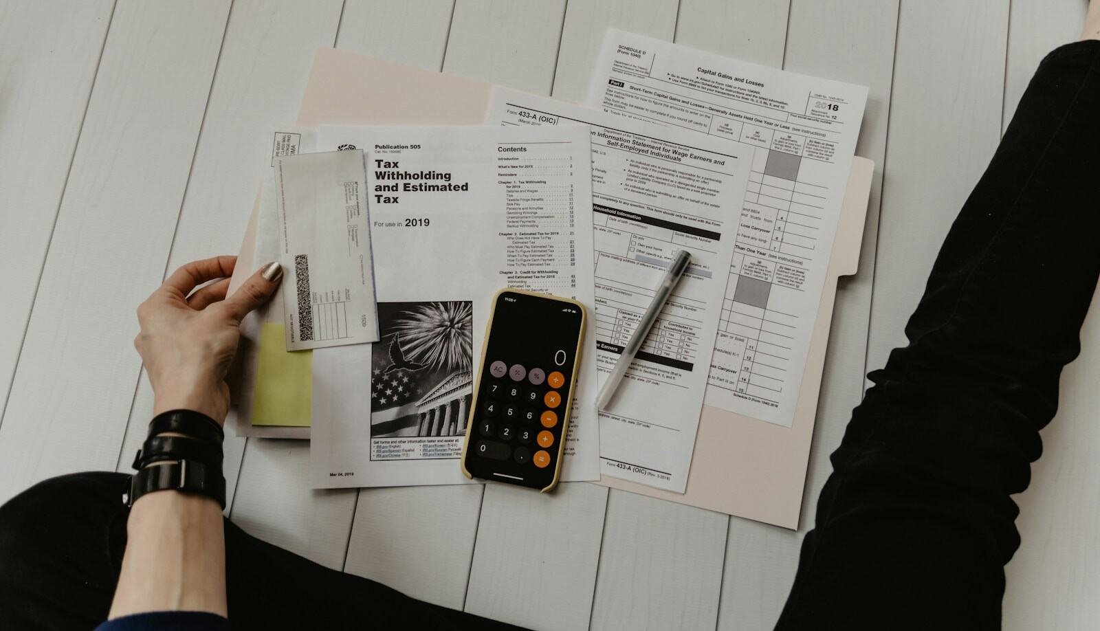 Legal documents and a pen on a desk